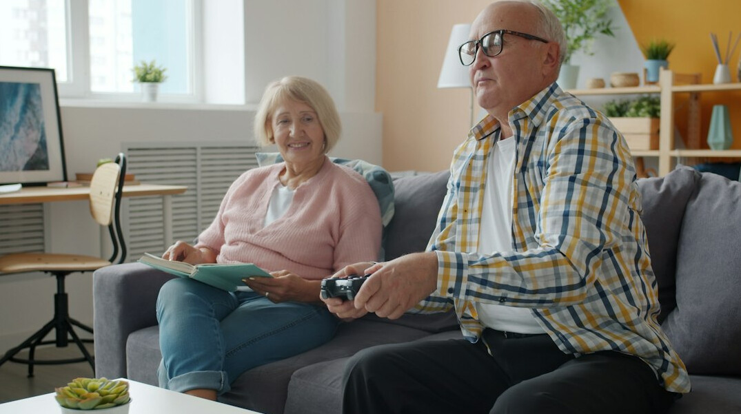 group of seniors chatting in cozy room