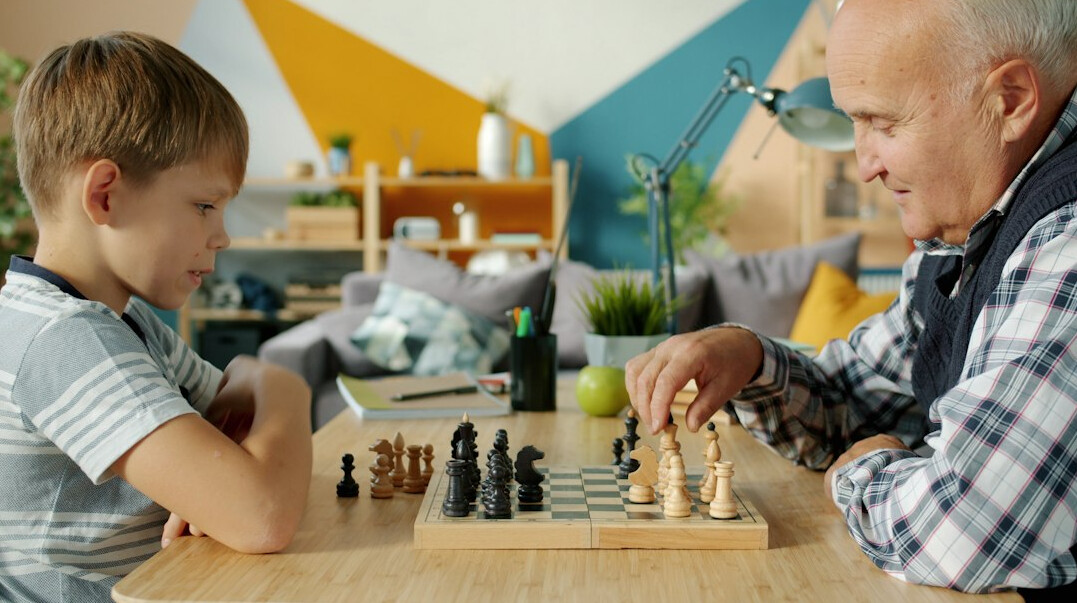 seniors playing board games indoors