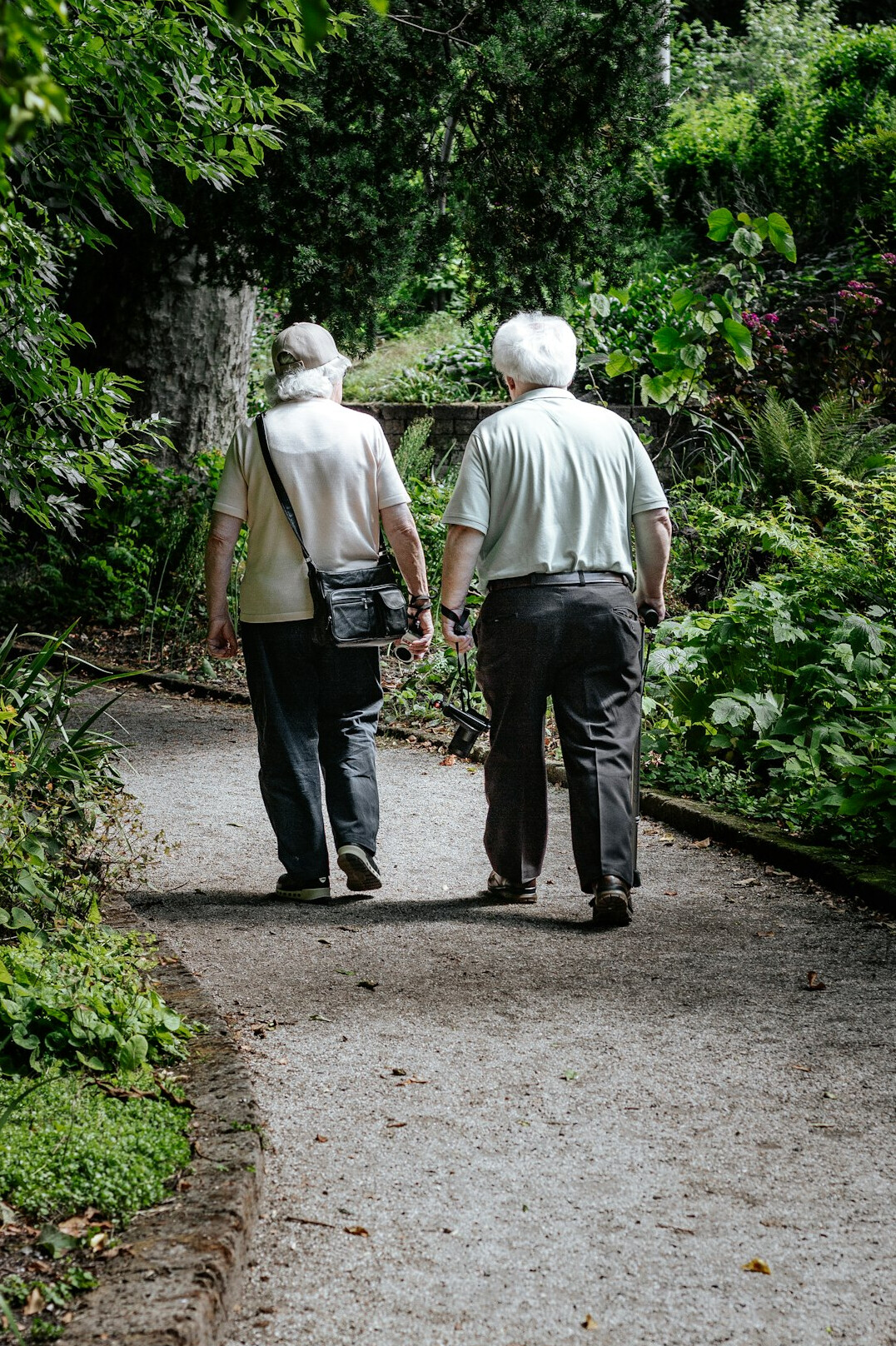 seniors walking in garden